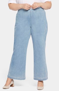 Polished wide-leg jeans offer a fit you'll love with stretchy denim, a pull-on waist and Lift Tuck® Technology that smoothes and supports in front and lifts in back. 31" inseam; 24" leg opening; 12" front rise; 19" back rise Pull-on style Back patch pockets 86% cotton, 11% elastomultiester, 3% Lycra® spandex Machine wash, line dry Imported Relaxed Fit Flared Cropped Jeans, Stretch Wide Leg Cropped Denim Jeans, Casual Flared Cropped Jeans In Relaxed Fit, Casual Flare Cropped Jeans With Relaxed Fit, Stretch Wide Leg Cropped Jeans, Pull-on Cropped Denim Jeans, Pull-on Cropped Jeans, Pull-on Style Cropped Jeans, Spring Straight Leg Flare Jeans With Elastic Waistband