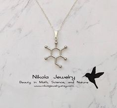 Molecule necklaces were featured on Buzzfeed and BUST magazine Glucose Molecule Necklace in Silver Glucose is a sugar with the molecular formula C 6H 12O 6. Glucose is overall the most abundant monosaccharide, a subcategory of carbohydrates. Purchase includes a molecule information card, a natural jewelry box, and gift packaging.  Gift? Add-on a hummingbird card for only $7: https://www.etsy.com/listing/202506976/nikola-jewelry-hummingbird-card Add-on extender: https://www.etsy.com/listing/197483038/add-on-necklace-extender-chain-with Necklace longer than 20 inches: https://www.etsy.com/listing/196689227/extend-my-necklace-up-to-30-inches Turn pendant into a keychain or ornament: https://www.etsy.com/listing/1003597263/turn-any-pendant-into-a-key-chain-or ★ ITEM DETAILS ★ Chain: Sterling S Glucose Molecule, Jewelry Mockup, Hummingbird Card, Molecule Jewelry, Chemistry Jewelry, Molecule Necklace, Natural Jewelry, Information Card, Necklace Extender