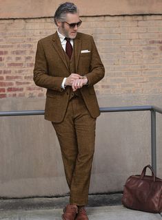 Venture into the essence of refined distinction with our Italian Highlander Mustard Herringbone Tweed Suit. Crafted from sumptuous wool, this masterpiece radiates with a vibrant mustard color, intricately woven with a striking black herringbone pattern that captivates and charms. It's not just attire; it's a declaration of style offering warmth and a luxurious texture that speaks volumes of its superior quality. Ideal for autumnal gatherings, prestigious business encounters or momentous celebrat Herringbone Tweed Jacket, Peaky Blinders Suit, Tweed Pants, Tweed Suit, Black Herringbone, Herringbone Tweed, Bespoke Suit, Green Suit, Grey Tweed