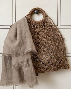 "Natural linen lightweight fringed scarf.  Greyish brown linen scarf. All seasons pure linen unisex trending item for men or women. Gift idea accessories. Dimensions approx: 200cm x 67cm (78\"x 26.5\") with fringes ends. * pure soft linen scarf, * fabric weight 93 g/m², *laundered and softened, *raw, un-locked fringe ends. The colors of the item may vary slightly due to different computer monitor settings. I invite you to visit my shop's linen scarfs section and view other accessories : https:// Men Scarf, Linen Scarf, Greyish Brown, Linen Scarves, Women Scarf, Grey Scarf, Fringe Scarf, Scarf Women, Minimal Chic