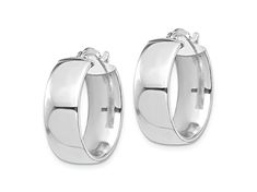 Rhodium over 14k white gold high polished hoop earrings. Measure approximately 13/16"L x 1/4"W and have saddleback backings. Classic Nickel-free Huggie Jewelry, Classic Small Hoop Sterling Silver Jewelry, Classic Sterling Silver Huggie Earrings, Formal Hypoallergenic Oval Hoop Earrings, Classic Sterling Silver Hoop Earrings For Pierced Ears, Classic White Gold Jewelry With Polished Finish, Elegant Rounded White Gold Jewelry, Small Hoop White Gold Fine Jewelry, Sterling Silver Rounded Jewelry With Polished Finish