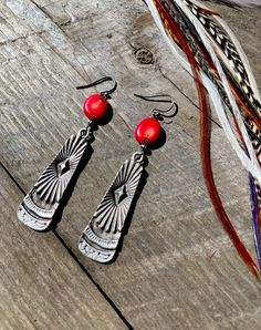 These Oxidized Silver Paddle earrings have a unique Southwestern design and true Western feel. Offering two different gemstone options: * Coin Red Coral * Coin Kyanite (beautiful hues of blue, bronze, and green) Total length = 2.5 inches Sterling Silver ear wire! Red Bohemian Sterling Silver Earrings, Bohemian Red Nickel-free Earrings, Southwestern Red Drop Earrings, Southwestern Red Dangle Earrings, Southwestern Style Red Dangle Earrings, Red Southwestern Dangle Earrings, Artisan Red Drop Earrings, Artisan Red Dangle Earrings, Artisan Red Teardrop Earrings