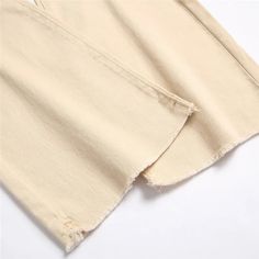 SPECIFICATIONS Brand Name: Dodobye Material: COTTONMaterial: POLYESTERElasticity: Medium StrecthFabric Type: SoftenerLength: full lengthFit Type: regularStyle: CasualDecoration: PocketsDecoration: HOLEDecoration: noneOrigin: Mainland US(Origin)CN: GuangdongJeans Style: FLARE PANTSWaist Type: highModel Number: CD696Release Date: Spring 2023Thickness: regularItem Type: JEANSGender: WOMENPlace Of Origin: US(Origin) (mainland)Closure Type: zipper flyChoice: yes 1. Choose matching size based on the S Non-stretch Grunge Cotton Pants, Trendy Cotton Pants With Frayed Hem, Baggy Cotton Pants With Frayed Hem, Casual Cotton Pants With Frayed Hem, Non-stretch Cotton Grunge Jeans, Grunge Cotton Bottoms With Frayed Hem, Beige Baggy Cotton Jeans, Beige Stretch Cotton Jeans, Trendy Beige Cotton Jeans