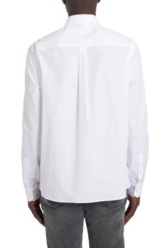 From the Italian label's 'essential' collection comes this crisp white cotton button-up in a slim Martini fit branded with an engraved logo at the chest pocket. 30 1/2" length; 44" chest (size 39) Front button closure Point collar Long sleeves with button cuffs Chest patch pocket 100% cotton Dry clean Made in Italy Men's Designer Clothing White Unstructured Button-up Top, White Cotton Shirt With Concealed Placket, Unstructured White Button-up Top, Casual White Shirt With Fold Down Collar, White Cotton Top With Fold Down Collar, White Tops With Concealed Placket And Relaxed Fit, White Relaxed Fit Tops With Concealed Placket, Classic White Button-up Shirt, Classic White Button-up Top