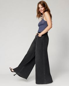 Embrace your soft side in our wide leg jeans, designed for the sweatpant lover. They hug you comfortably at the waist and then flare out like a 70's dream. Peep the special little front pocket made for your fave lip gloss. Chic Wide Leg Flare Jeans In Washed Black, Chic Wide Leg Washed Black Flare Jeans, Dark Wash Full Length Cotton Flares, Full-length Dark Wash Cotton Flares, Full Length Dark Wash Cotton Flares, Casual Washed Black Wide Leg Flare Jeans, Casual Wide Leg Flare Jeans In Washed Black, Casual Wide-leg Flare Jeans In Washed Black, Casual Wide Leg Flares For Fall