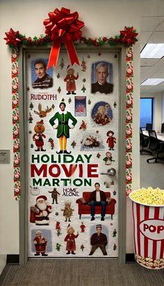 an office door decorated with christmas decorations and movie characters for the holiday movies marathon at work