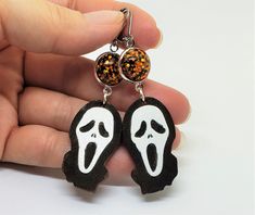 These "Scream" earrings are so fun! Hand painted on wood and accented with orange glitter resin connectors. These earrings are 3 inches long including the surgical grade stainless steel lever back closures and are super lightweight. One of a Kind ** Price includes Shipping costs with no minimum dollar amount required ** ** I am happy to gift wrap (at no extra cost to you) if requested ** Scream Earrings, Fun Halloween Earrings, Orange Glitter, Goth Jewelry, Halloween Earrings, Hand Painted Wood, Painted Wood, Halloween Fun, Scream