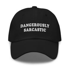 "This \"Dangerously sarcastic\" quote is embroidered on a adjustable Unisex Baseball Cap. This 100% cotton baseball hat is perfect for everyday use. Just like a dessert is always better with a cherry on top, a casual outfit looks better if you're styling it with a classic dad hat. Choose your colors! * 100% chino cotton twill * Green Camo color is 35% chino cotton twill, 65% polyester * Unstructured, 6-panel, low-profile * 6 embroidered eyelets * 3 ⅛\" (7.6 cm) crown * Adjustable strap with anti Lineman Gifts, Cool Baseball Caps, Electrician Gifts, Gifts For Truckers, Senior Discounts, Funny Hats, Embroidered Hat, Embroidered Caps, Hat Baseball