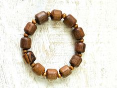 Brown, neutral, tan wood stretch bracelet. This bracelet was made for people with small wrists. It's 6 3/4 inches. Recycled Bracelets, Long Chandelier, White Agate, Agate Gemstone, Stretch Bracelet, Stretch Bracelets, Beautiful Earrings, Etsy App, Selling On Etsy