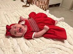 This beautiful red baby girl dress hand smocked in white and hand embroidered with white flowers . The dress completes it's look with white Peter Pan collar and beautiful smocked puffed sleeves. Dress is fully lined with a soft cotton material. The back closes with a zip and tie sashes. 3-6 months & 6-12 months sizes come with a bow attached headband. Size 1 onwards come with a bow clip. Material Outside- 100% Cotton Lined with soft cotton fabric Recommend Dry clean only Available sizes: Size 3- Cute Red Smock Dress, White Smocked Dress, Dress With A Bow, Girls Smocked Dresses, Dress Baby Girl, Headband Size, Baby Blue Dresses, Hand Smock, Bow Clip