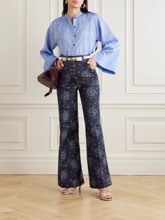 Etro's jeans are made from dark navy denim that's jacquard-woven with an intricate floral motif. Inspired by retro designs, they're cut with flared legs, traced with crisp pressed pleats and finished with logo-engraved buttons. Complete the look by tucking a floaty blouse into the high waist. Jean Trench Coat, Flare Jeans Outfit, Printed Denim Jeans, High Rise Denim Jeans, Flare Denim Jeans, Sport Swimwear, Retro Designs, Printed Denim, High Rise Denim