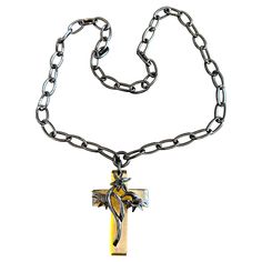 Indulge in a magnificent rare antique Art Deco Bakelite Cross Pendant Necklace. The stunning cross is adorned with a fully three dimensional flower. The dramatic use of the honey colored bakelite cross with the black flower is absolutely wonderful. The cross hangs from a long black bakelite link chain of 26 inches. The flower cross and long black link chain create one of the most beautiful early Bakelite jewels we have seen and is the work of a master artisan. And Crosses are the height of fashion today as evidenced by Kim Kardashian's recent purchase of Princess Diana's Amethyst Cross for $197,453. The cross portion is 2 3/4 inches (7 cm) tall. The cross is 1 7/8 inches wide. The necklace chain is 26 inches long. Necklace Art Deco, Flower Cross, Necklace Art, Princesa Diana, Honey Colour, Black Flower, Antique Art Deco, Cross Pendant Necklace, Fashion Today