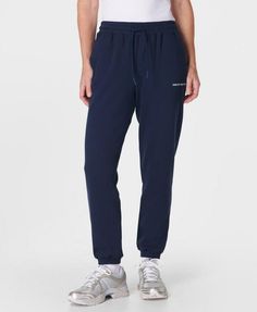 A relaxed new take on our elevated sweatpants. Made from a soft and breathable French terry cotton blend. Loose fit with sporty side panel stitching. Elasticated cuffs and a drawcord at the waist  . Two side pockets. Inseam length: 71.5cm /  28”. Model wears size S and is 178cm/5'10" tall. Style Code: SB9915Colour: Navy Blue Relaxed Fit Joggers With Elastic Side Panels For Loungewear, Comfortable Relaxed Fit Sweatpants With Elastic Side Panels, Relaxed Fit Joggers With Elastic Cuffs For Jogging, Sporty Sweats With Elastic Waistband And Relaxed Fit, Sporty Activewear With Tapered Leg And Elastic Cuffs, Sporty Everyday Activewear With Drawstring, Loungewear Sweatpants With Tapered Leg And Elastic Side Panels, Loungewear Sweatpants With Elastic Side Panels And Tapered Leg, Loungewear Tapered Leg Sweatpants With Elastic Side Panels