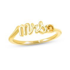 Mark a bride's change of status with this charming ring featuring "Mrs." spelled out in elegant 10K yellow gold letters. A citrine perfectly punctuates the word art, adding a pop of color and making it a delightful piece to highlight the wedding colors or unique sense of style of the wife-to-be. Yellow Gold Initial Ring For Mother's Day Wedding, Yellow Gold Initial Ring For Wedding On Mother's Day, Personalized Yellow Jewelry For Anniversary, Yellow Gold Wedding Rings With Custom Name, Wedding Initial Ring With Birthstone, Mrs Ring, Wife To Be, Gold Letters, Word Art