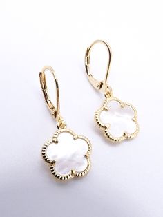 Artistically crafted with intricate exquisite style! These gorgeous ultra lightweight dainty leverback hook earrings feature a 18kt gold plated 5 petal mother of pearl shell clover flower. Lightweight, ornate and delicately crafted, these luxurious ultra lightweight clover earrings are truly one-of-a-kind and look great worn for any occasion. Available in 18kt Gold Plated and 18kt White Gold Plated with matching bracelets and necklaces also available.  ☆ Specifications: * Approximate size  1 1/8 Gold Floral Earrings With Lever Back, Elegant Floral Earrings With French Hook, Elegant Flower Shaped Earrings With French Hook, Elegant Hypoallergenic Flower-shaped Earrings, Elegant Hypoallergenic Flower Shaped Earrings, Elegant Flower Earrings With French Hook, Elegant Flower Drop Earrings With Lever Back, Elegant Dangle Flower Earrings With French Hook, Elegant Flower-shaped Earrings With French Hook