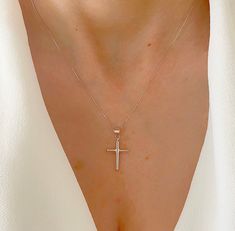 "Real 14K Plain White Gold Cross Necklace. Great Gift To Give Yourself And To Others. Minimal Cross Comes With The Option Of A High Quality Box Chain That Feels Very Silky. A Beautiful Gift She Will Treasure Forever! Jewelry Comes In A Cute Gift Box Ready To Present. Model Is Wearing 16\" Chain. -All Jewelry Is New And Inspected For Quality Assurance. -Jewelry Is Crafted In Genuine High Quality 14K Gold. -We Do Not Sell Gold Plated. Product Detail: Metal: 14k white gold Weight: 0.7 grams Height Sterling Silver White Gold Necklace For First Communion, White Gold Sterling Silver Jewelry For First Communion, White Gold Sterling Silver Cross Necklace For Wedding, Silver Classic Jewelry For Baptism, Classic Silver Jewelry For Baptism, White Crucifix Necklace For Formal Occasions, Sterling Silver White Necklace For Baptism, White Sterling Silver Necklace For Baptism, White Gold Cross Jewelry For Baptism