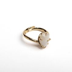 Moonstone Adjustable Ring Moonstone, celebrated as the "Stone of New Beginnings," is known for its ethereal glow and its deep connection to the moon's cycles and feminine energy. This gemstone has been revered for its ability to enhance intuition, balance emotions, and support personal growth. The Moonstone Adjustable Ring, crafted from non-tarnished metal, beautifully captures the gentle radiance of moonstone in a versatile and elegant design. Product Details Gemstone: Moonstone - Valued for it Healing Crystal Ring, Ring Moonstone, Moon Cycles, Deep Connection, Crystal Ring, Ring Gemstone, Moonstone Ring, Feminine Energy, Design Product