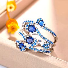 Lovely Teardrop Shaped Simulated Blue Diamonds And Round Accents Are The Star Of This Exquisite Designed Ring. Great Gift!Gold Plated Blue Teardrop Fine Jewelry Ring, Blue Teardrop Promise Ring, Blue Diamonds, Ring Color, Plated Ring, Gold Plated Rings, Blue Diamond, Womens Jewelry Rings, The Star