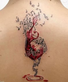 a woman's back with music notes and a wine glass