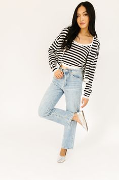 it’s a tank, it’s a cardigan – it’s a tank + cardigan combo. detailed with a retro-inspired black + white stripe pattern, this cropped sweater tank + cardigan set is a spring outfit staple. wear them together or separately to elevate any outfit. black + white // two piece set, scoop neckline, buttons, drop shoulder paired with our sicily distressed denim model is 5'8" + wearing a small measurements are approximate + taken while laying flat small : bust 44” length 18.5” tank: small : bust 28” len Trendy Spring Crop Top Sweater, Trendy Crop Top Sweater For Spring, Chic Knit Cropped Sweater For Spring, Spring Day Out Cropped Sweater, Spring Cropped Sweater For Day Out, Knit Crop Top Sweater For Spring, Striped Cropped Sweater For Spring, Spring Striped Cropped Sweater, Trendy Cropped Striped Sweater