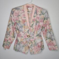 Fredericks Of Hollywood Vintage Blazer 9/10 Womens Lightweight Pastel Floral 1-Button V-Neck Shoulder Pads New With Tag 57% Polyester, 43% Rayon 42" Bust, 24" Length Size 9/10 By Fredericks Of Hollywood. Pink V-neck Outerwear With Button Closure, Fitted Vintage Blazer With Floral Print, Vintage Fitted Floral Print Blazer, Fitted Vintage Floral Print Blazer, Vintage Floral Print Blazer For Spring, Vintage Pink Spring Outerwear, Feminine Spring Blazer With Buttons, Vintage V-neck Fitted Outerwear, Vintage Fitted V-neck Outerwear