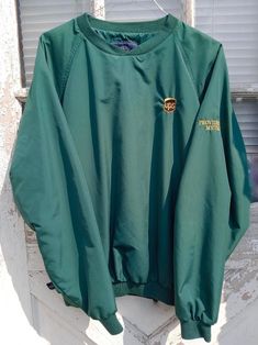 "Lightly used unique green pullover UPS windbreaker jacket Mens XL Providence, RI. V-neck lined windbreaker with rib knit on cuffs and bottom hem of jacket. Outer is polyester, inside is lined with nylon. UPS logo on chest, \"Providence, RI\" in lettering on left sleeve. Manufactured by Charles River Apparel. NOT handmade." Green Crew Neck Outerwear For Outdoor, College Winter Crew Neck Windbreaker, College Winter Windbreaker With Crew Neck, Ups Logo, Windbreaker Jacket Mens, Green Pullover, Charles River, Providence Ri, Windbreaker Jacket