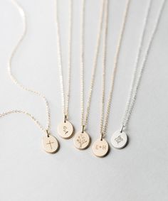 "Custom Personalized Small Oval Necklace. Makes a great gift with initials or symbols! Choose up to three small oval pendants to personalize with your fave initials or symbols. D I A N A ∙ S M A L L ∙ O V A L ∙ N E C K L A C E D E T A I L S * 100% 14k Gold Filled, Sterling Silver, or 14k Rose Gold Filled * All raw materials are USA sourced * The Small Oval is approx 9x13mm These ovals are also available in another size! * Tiny version of this piece: https://www.etsy.com/listing/616325794 I T ' S Oval Pendant Necklace, Custom Initial Necklace, Oval Necklace, Custom Initials, Oval Pendant, Necklace Personalized, Silver Roses, Silver Rose Gold, Initial Necklace