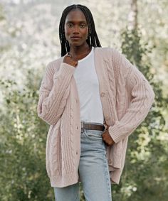 Cable Cocoon Cardigan Blush Using our best-selling cardigan as inspiration, our take on the chunky cable knit sweater is the latest layer you'll want to collect in every color. The luxuriously lightweight feel makes for the perfect year-round wear—whether paired with sweats or styled with a dress. 39% baby alpaca, 39% merino wool, 22% nylon. Made in China of Italian yarn. Lofty cable knit sweater with a relaxed silhouette. Faux-horn buttons. Due to the nature of the fabric, slight shedding may o Casual Cable Knit Cardigan For Loungewear, Trendy Cable Knit Sweater Coat For Spring, Relaxed Fit Cable Knit Sweater For Spring, Spring Cable Knit Cardigan, Casual Cable Knit Outerwear For Layering, Trendy Cable Knit Loungewear Outerwear, Trendy Cable Knit Outerwear For Loungewear, Spring Cable Knit Loungewear Cardigan, Cozy Cable Knit Loungewear Cardigan