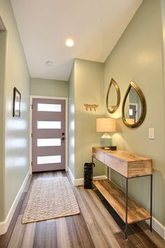 the hallway is clean and ready to be used as a home office or living room