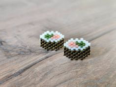 the earrings are made out of small beads