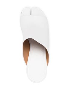 White leather peep-toe low-heel mules from Maison Margiela featuring peep toe, slip-on style, open back and low block heel. Size Info IT Color Detail White Made In Italy Material Outer: Leather 100% Lining: Leather 100% Sole: Leather 100% Season One Spring-Summer Season Two Spring-Summer Product sandals Brand Maison Margiela Size And Fit Heel 2,8 in / 7 cm; Platform 0,4 in / 1 cm Formal Spring Open Toe Clogs, Formal Open Toe Clogs For Spring, Formal Open Toe Slip-on Mules, Formal Slip-on Open Toe Mules, White Slip-on Open Toe Heels, Slip-on Open Toe Mules For Formal Occasions, White Open Toe Classic Mules, White Open Toe Mules With Sculpted Heel, Formal Open Toe Slip-ons