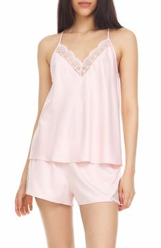 Perfect for romantic evenings, this elegant pajama set crafted in smooth matte satin includes a lace-trimmed racerback camisole and matching shorts. 2-piece set Top has V-neck; adjustable straps; open racerback; scalloped lace trim; satin construction Shorts have elastic waist; scalloped lace trim; satin construction 100% polyester Hand wash, dry flat Imported Model stats: 5'10" height, 32" bust, 25" waist, 36" hip. Model is wearing size S. Feminine Cami Sleepwear For Night, Wedding Night Camisole Sleepwear, Feminine Sleepwear With Spaghetti Straps For Wedding Night, Feminine Sleeveless Sleep Sets, Feminine Spaghetti Strap Sleepwear For Wedding Night, Elegant Sleep Sets With Camisole, Elegant Camisole Sleep Sets, Feminine Sleeveless Sleepwear For Wedding Night, Elegant Sleepwear For Pajama Party