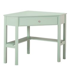 a small green desk with one drawer open