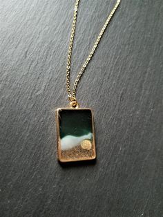 This beautiful necklace is a wonderful idea for gift giving and as a little gift for yourself. The pendant measures approximately 3 cm x 2 cm. Please choose your chain length preference in the drop down box. See more jewellery here: https://www.etsy.com/shop/simplysweetjewellery I'm happy to help you find what you're looking for! Please feel free to message me with any questions. Thank you for shopping at Simply Sweet Jewellery! PLEASE NOTE: Colours may not look the same as on your computer - Av Nature-inspired Jewelry With Adjustable Chain As Gift, Nature-inspired Necklace With Adjustable Chain For Gift, Nature-inspired Necklace With Adjustable Chain As Gift, Green Necklace With Large Pendant As A Gift, Green Spiritual Necklace As Gift, Spiritual Green Necklace For Gift, Handmade Gold Necklace With Rectangular Pendant, Gold Rectangular Pendant Necklace For Keepsake, Handmade Square Pendant Necklace As Gift