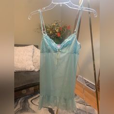 Sexy, See-Through Top And Panty. Never Worn! Size L. Aqua With Yellow Bow. 20” From The Bustline To Bottom. Panty Is A T/G String. Victoria's Secret Camisole For Loungewear, Victoria's Secret Blue Sheer Sleepwear, Victoria's Secret Sheer Blue Sleepwear, Flirty Victoria's Secret Sleepwear For Loungewear, Blue Spaghetti Straps Sleepwear, Blue Lace Sleepwear For Loungewear, Victoria's Secret Blue Sleepwear With Lace Trim, Victoria's Secret Fitted Sleepwear For Lounging, Fitted Victoria's Secret Sleepwear For Lounging