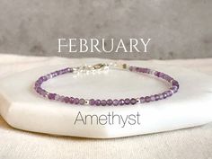 "Amethyst Birthstone Bracelet ∙ Born In February ∙ Aquarius Gift A M E T H Y S T - is associated with the crown chakra and is a meditative and calming stone which works to promote calm, balance, and peace. It is connected with spiritual growth and protection and is also used to eliminate impatience. These crystal gemstones are also known for bringing clarity of the mind to the owner. This is an amazing gift for someone you love. The perfect gift! Dainty, super sweet, and made for stacking! Class Amethyst Gemstone Bracelets For Anniversary, Amethyst Gemstone Bracelet For Anniversary, Anniversary Amethyst Gemstone Bracelet, Amethyst Birthstone Beaded Bracelet Gift, Amethyst Beaded Bracelet With Birthstone As Gift, Purple Gemstone Accented Bracelet For Gift, Purple Gemstone Accents Bracelets As Gift, Purple Gemstone Accents Bracelet For Gift, Purple Bracelets With Gemstone Accents For Gift