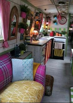 the inside of a home decorated in bright colors