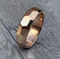 a wedding ring with an unusual design on it