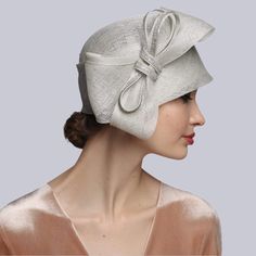 📌UPS Next Day Air option is available TOUCH OF CHARM AND ELEGANCE Charming Cloche Hat Derby Church Wedding Headwear Look at your very best, this Sinamay Cloche Summer Hat glorifies your personality and enhances the positivity of your etiquette on all occasions. Grosgrain ribbon inside for a better posture. - 57cm(22,4 inches)-59cm(23,23 inches)sizes; - Sinamay fabric; - Cloche shape; - Available in a few colors; Sinamay hats are created using high-quality handwoven sinamay fiber which is so lig Beige Cloche Hat For Wedding, Fitted Cream Cloche Hat For Wedding, Fitted Beige Cloche Hat For Church, Sinamay Fascinator For Church, White Fitted Cloche Hat For Formal Occasions, Elegant Fitted Wedding Headpieces, Classic Fitted Cloche Hat For Wedding, Gatsby Style Cloche Hat For Kentucky Derby Wedding, Gatsby Style Fitted Cloche Hat For Wedding