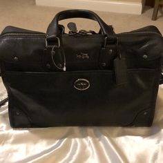 Beautiful Coach Purse, Black Leather With Black Chrome Rivets And Buckles. Zipper Close With Inner Pocket. Adjustable Strap. , Nwot. Dust Bag Included. Elegant Black Briefcase With Zipper Closure, Black Leather Briefcase With Branded Hardware, Designer Black Briefcase For Work, Classic Black Briefcase With Branded Hardware, Elegant Coach Briefcase For Travel, Designer Bags With Snap Closure For Formal Occasions, Coach Leather Handbags, Vintage Shoulder Bag, Gold Bag