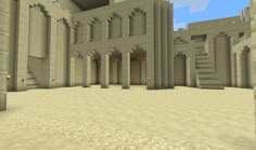 an image of a very large building in the middle of a desert area with columns and pillars