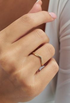 Beaded Chevron Band 14k Solid Gold Ring, V Shaped Stackable Ring, Curved Band Ring, Real Gold Jewellery, Matching Wedding Band Material: Solid Gold Karat: 14 K (585) Want to Check Out More from Our Sections FİEMMA http://www.etsy.me/3ukWhje Gold Rings http://www.etsy.me/39E9NGS Gold Necklaces http://www.etsy.me/31NdjtO Gold Bracelets http://www.etsy.me/2QT9SzF Gold Earrings http://www.etsy.me/3mfSmRK Gold Pendants http://www.etsy.me/3uiXrLZ Gold Chains http://www.etsy.me/2PzqkVB Wholesale requests are welcome. **Please see our policies section for shipping and return information. Feel free to contact me with any questions or request Fine Jewelry With Decorative Band For Promise, Hand Set 14k Yellow Gold Rings, Diamond Cut Band Jewelry For Gift, Cute Promise Rings, Gold Pendants, Real Gold Jewelry, Gold Rings Stackable, Chevron Ring, Solid Gold Ring