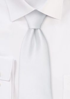 Exude timeless elegance with our White Solid Necktie. This captivating accessory epitomizes sophistication and refinement. The pristine white hue adds a touch of purity and class to any ensemble, making it an essential choice when shopping for mens suits or seeking the perfect accent for a dashing tuxedo look. Whether you're attending a wedding or a formal event, this necktie exudes a classic and sophisticated charm. Its solid design allows for effortless pairing, complementing a range of suit c Suit Colors, White Ties, White Solid, White Tie, Necktie, Mens Suits, Formal Event, Fashion Games, A Wedding