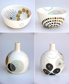 four different vases with designs on them