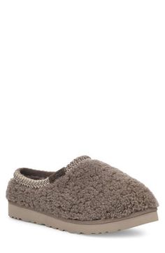 Exceptionally plush and indulgently comfortable, this fan-favorite slipper wrapped in thick curls of genuine shearling features a signature UGGbraid rope framing the collar and a lightweight sole made of sugarcane EVA. It's lined with cushy, warm UGGplush, a moisture-wicking textile made from a wool-rich blend but crafted to feel and wear like genuine shearling. Genuine shearling upper/UGGplush wool-blend lining/synthetic sole Shearling may be sourced from Australia, Ireland, Spain, the UK or th Rope Frame, Ugg Tasman, Shearling Slippers, Mens Slippers, The Uk, Moisture Wicking, Wool Blend, Men's Shoes, Spain