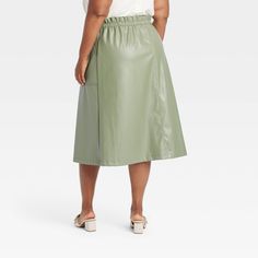 Dress up for weekend brunches or casual date nights in chic style with this Faux-Leather Midi A-Line Skirt from Ava & Viv™. This classic-fit skirt is crafted from midweight faux leather and tailored in a midi length for comfortable wear. A drawstring elastic waistband lends a secure fit, while front patch pockets complete the look with functional flair. Pair it with just about any blouse or sweater in your closet for a number of versatile looks. Casual Date Nights, Faux Leather Midi Skirt, Fit Skirt, Leather Midi Skirt, Date Nights, Casual Date, Faux Leather Fabric, Denim Midi Skirt, High Rise Denim