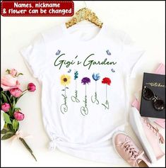 a t - shirt with flowers on it and the words geri's garden