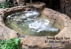 small rock spa with water flowing from it