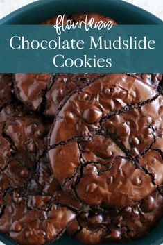 chocolate mudslide cookies in a blue bowl with text overlay that reads flour road chocolate mudslide cookies