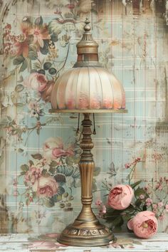 an old fashioned lamp with pink roses on the table in front of a floral wallpaper